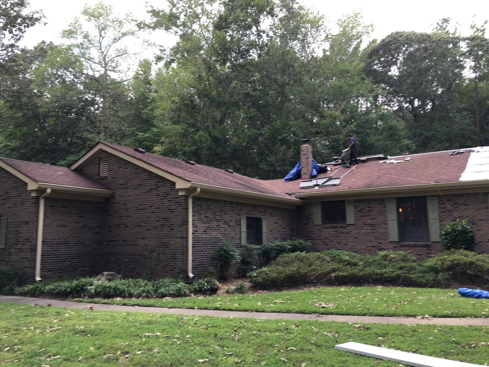 Shingle-to-Metal-Roof-Replacement-on-House-Before